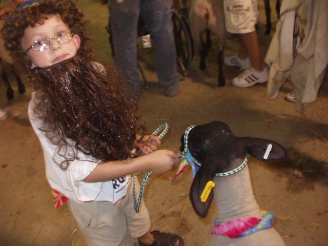 Timothy is dressed as Rupert (longer beard) and his lambs name is Rupert. 