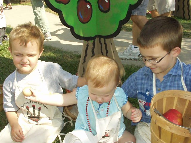 Abigail usually likes eggs :) The sun was so bright that I couldn't get the kids to look up!! hehe