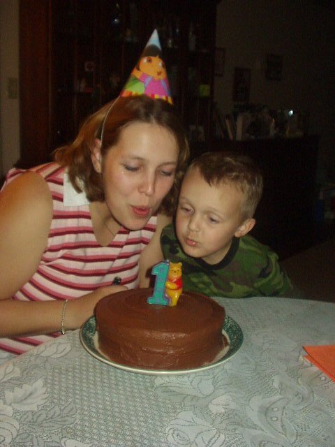 Elijah helped Mommy blow out the candle on her cake!