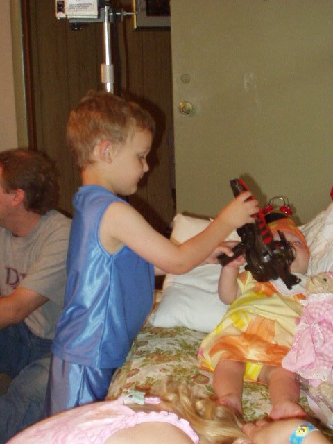 Elijah is showing Mary one of his new toys :)