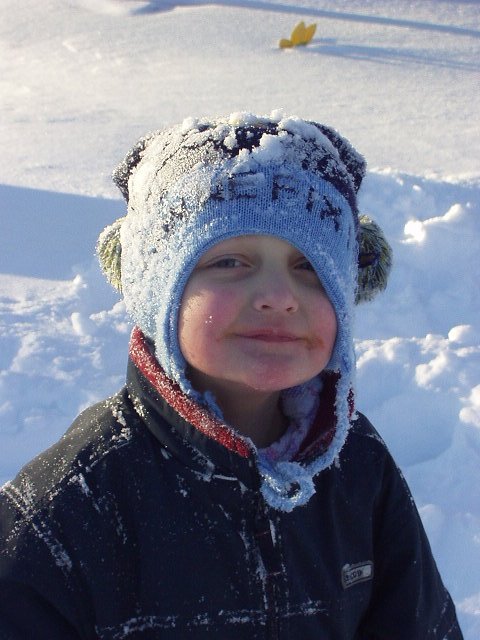 Even the snow didn't get Elijah's face clean :) hehe
