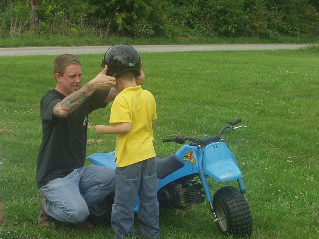 Uncle Jessup is getting Timothy ready to RIDE!!!