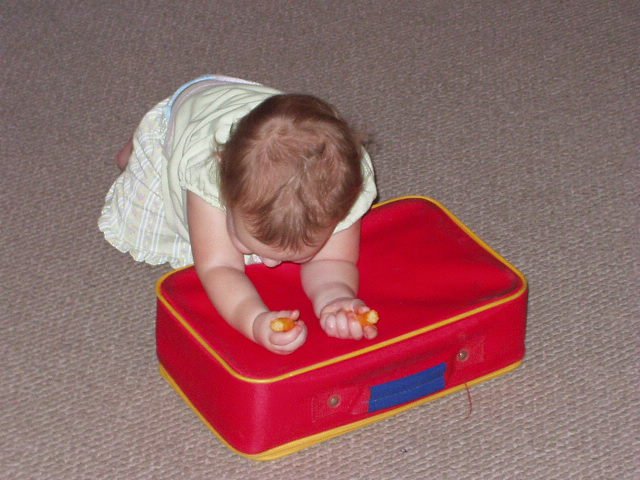 Abigail is praying with her cheese curls :) 