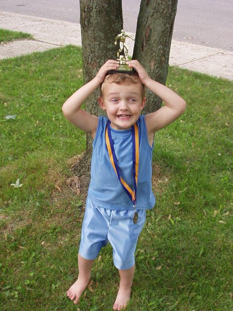 I am sooo excited!! I put my trophy next to Timmys :)