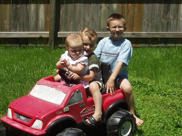 Seeeee....we can fit!! (Mary is watching from a distance :) She thinks her little sister and big brothers are crazy!)