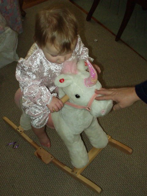 My new neigh-neigh has red ear rings! I gave my other neigh a ride also :)