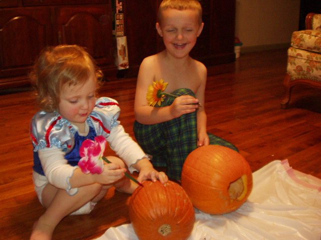 Elijah and Abigail are having fun drawing pictures :}