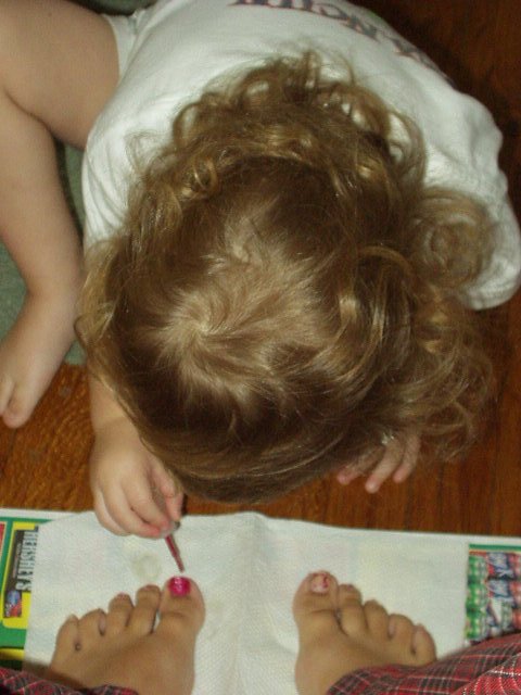 Abigail decided she wanted to paint my ugly toes!!! And I let her :)
