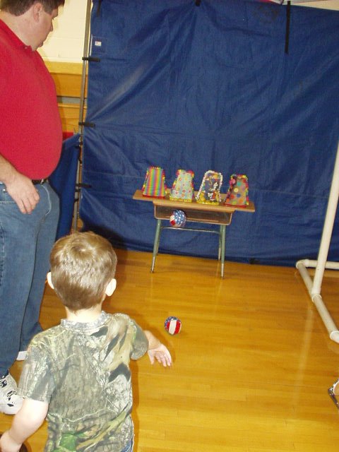 Elijah was a little short of knocking the bags over :)