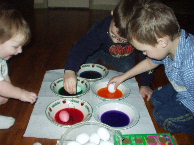 Abigail wanted to take this project over :) Timothy takes it serious!! Elijah is trying not to break the egg :)