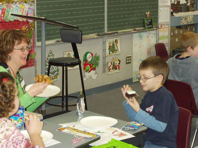 Timothy eating lunch with his teacher :)