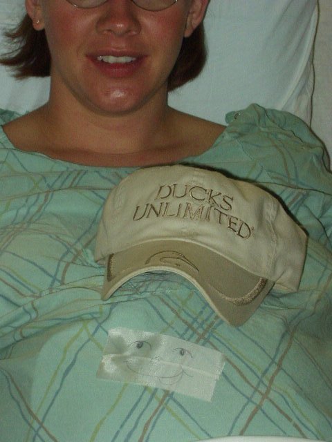 Aidan wearing Daddy's hat :) hehe