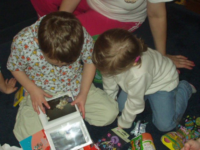 Elijah loves his dino album from Mamaw :)