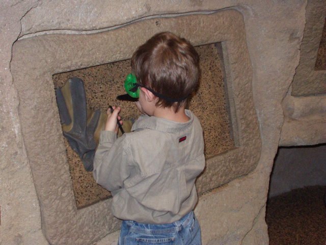 I love digging out the dinosaur bones (note the green glasses)!!