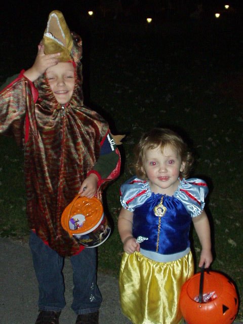 Elijah and Abigail ready to get MORE candy!!