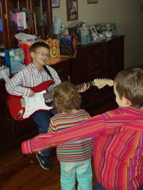 Elijah and Abigail 'ROCK ON' with Timothy!!!