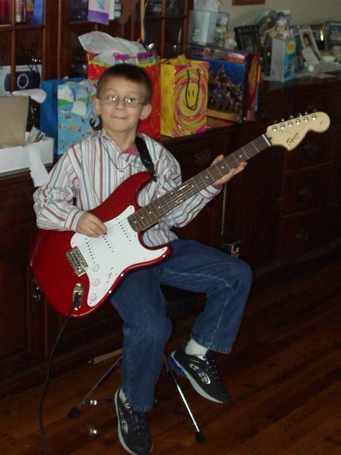 I can't believe I have my own guitar!!! AwEsOmE!!!