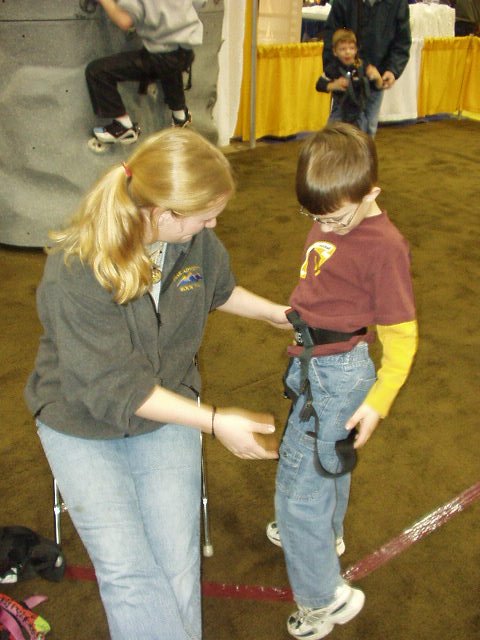 Timothy is getting his gear on so that he can climb "Rock Mountain"!