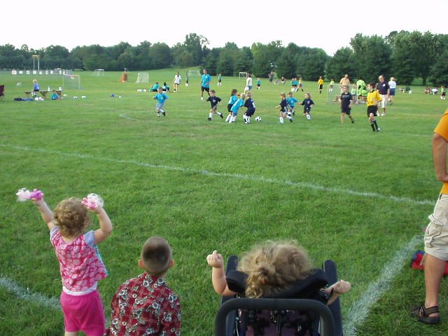 Elijah has his own little cheer section :) Mary and Abigail are really excited!