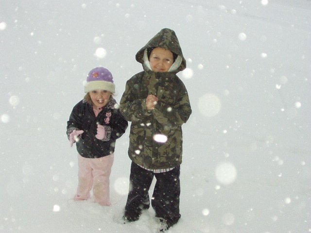 So, the kids begged me for several minutes... "We want to go outside!"...and now they are cold! Go figure!!