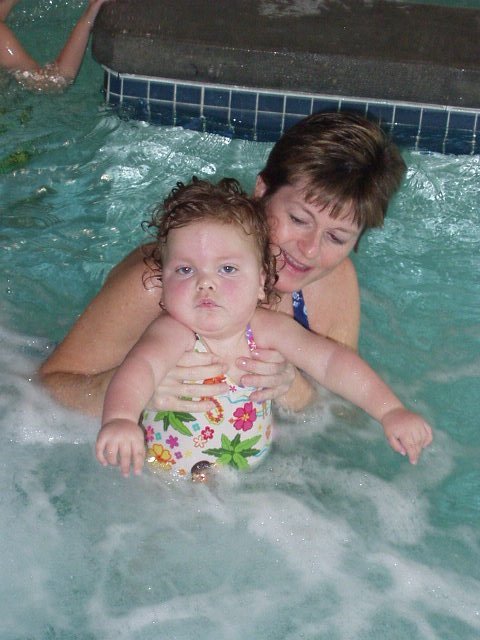 I refuse to smile!!! Mommy took a zillion pictures of me!! Good grief woman..get a job :) hehe