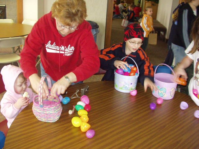 Mamaw is helping Abigail with her eggs...