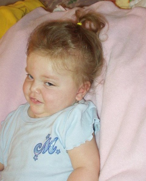 Mommy put my hair up in a pony.. I'm cute :)