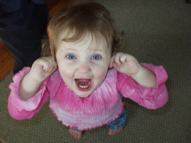 Abigail likes to stick her fingers in her ears and say 'mama watch this'..and then SCREAM!!!