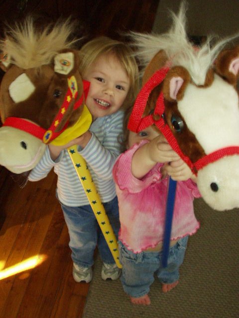 Caitlyn and Abigail have their pictures taken with the neigh neighs :)