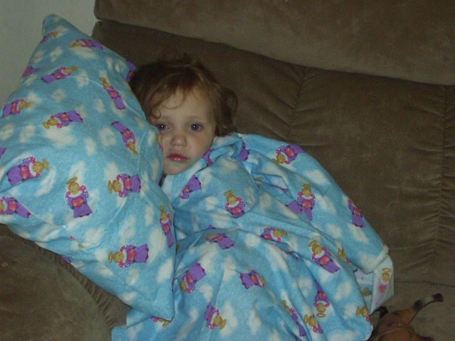 Abigail with her new pillow. She did smile AFTER I took the picture :)