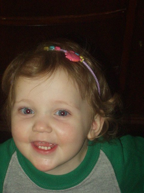 Her eyes are red...but, I thought this was a cute picture :)