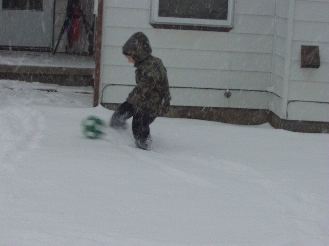 Elijah loves to play soccer in the snow....brrrrrrrr.....
