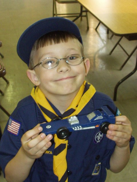 Timothy with his Derby car! I will have race pictures next week :) Umm..the boys showed up to race and someone forgot to show up with a track!!!!!