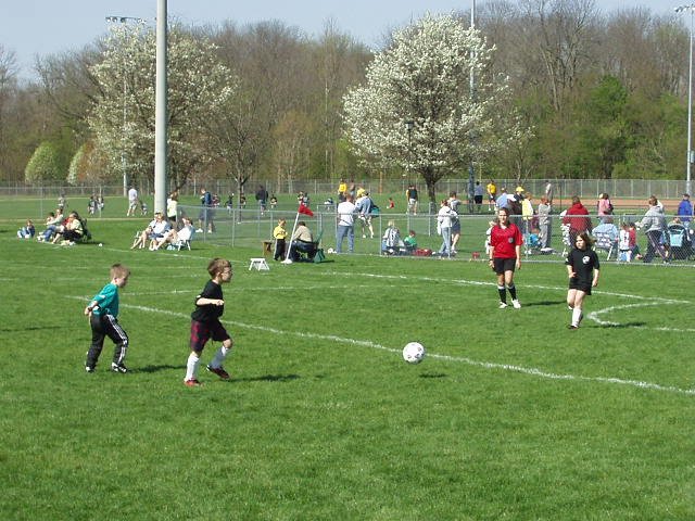 This picture is neat. The ball is still in the air!!