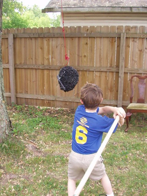 Timothy is going to give the piñata one (1) good smack! :)hehe