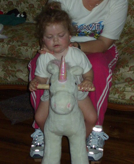 Hold on Mamaw!!! I can tell this horse is a wild one!!