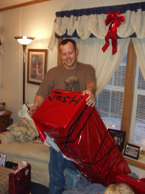Well....Hans said he wrapped the gift and spelled "JOSH" all by himself!! Good BOY! (can you tell?? ha!!)