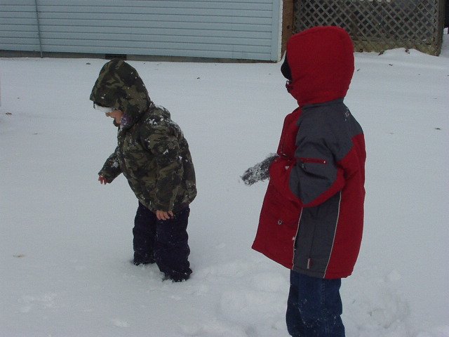 Timothy nailed Elijah in the face with a snowball! (after I said NO!) SO, we went inside :P