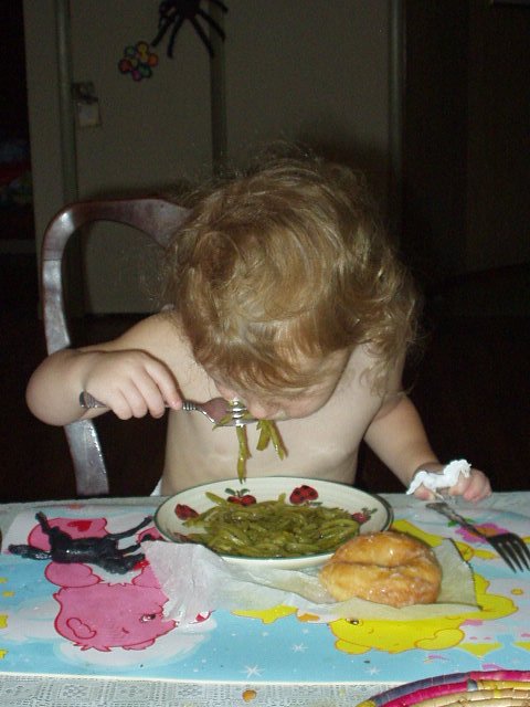 Abigail would rather eat a veggie than a doughnut!!! I would say she takes after Grandma more than Mommy!!! LOL
