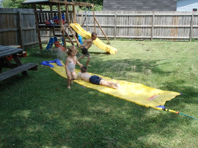 Timmy has the belly slide down pat.