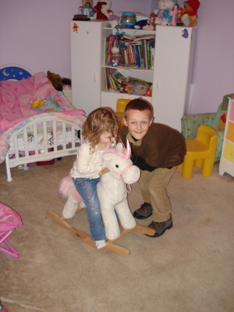 Elijah wants to join in the pony riding.