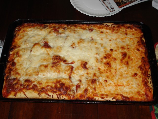 Saturday-night-pizza-from-scratch rocks! :)  2/3 Timmy & Daddy toppings, 1/3 Elijah Toppings