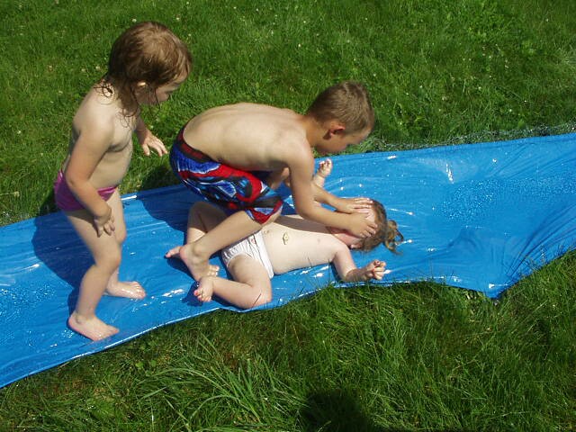 Mommy....will you get Elijah off of me?