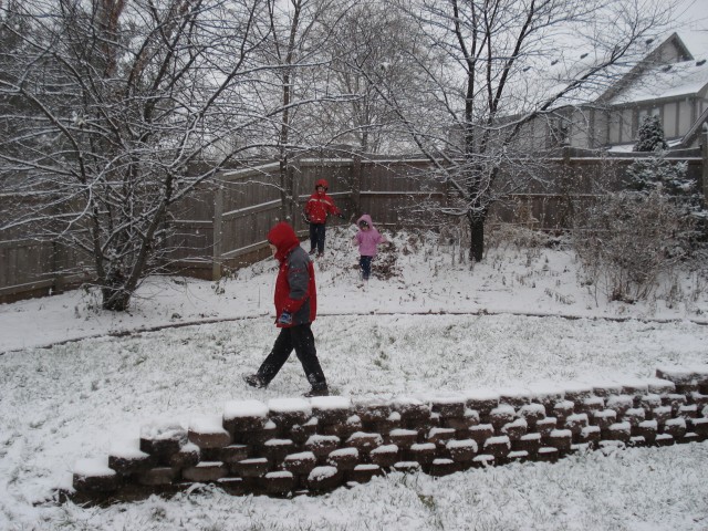 It hadn't quite finished snowing on Saturday when the kids went out to play!
