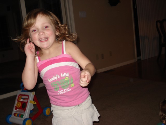 Abby changed clothes more times on Saturday than a model does at a fashion show.  I guess she put this outfit on to go to the beach??