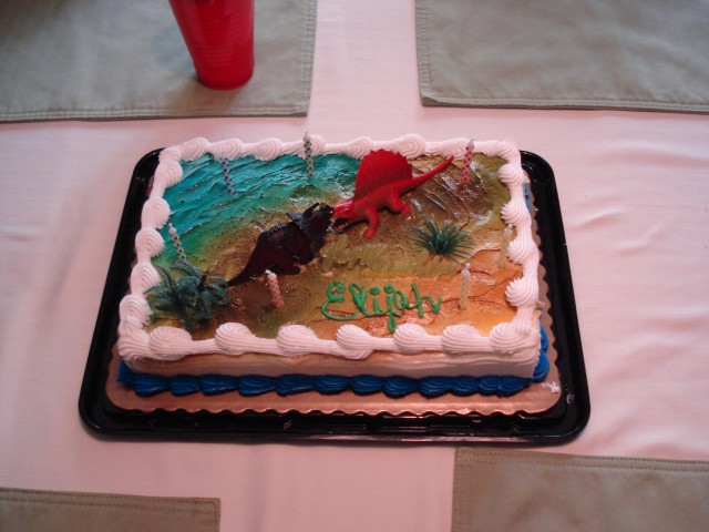 Elijah wanted a cake with dinosaurs and trees!