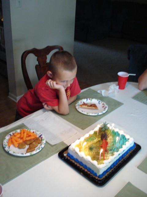 Cheese pizza for the birthday boy (and cheesy poofs and chicken nuggets for Abby?)