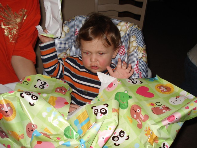 Look at all of the wrapping paper.  Surely there is a gift in there somewhere.