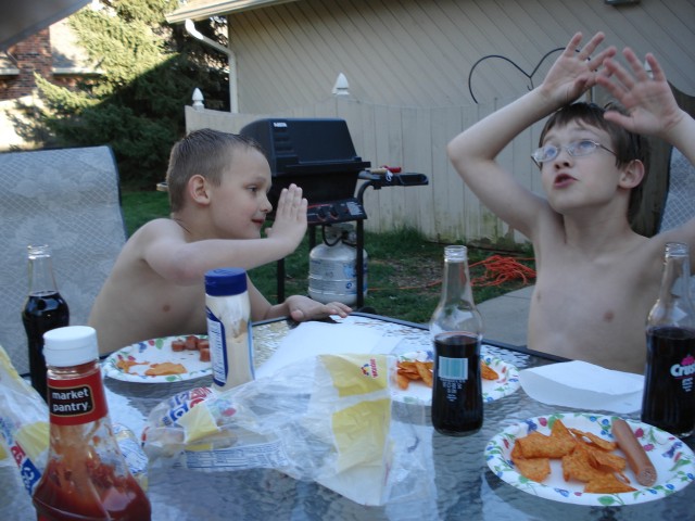 Timmy is trying to describe how crazy his mother is with hand gestures.