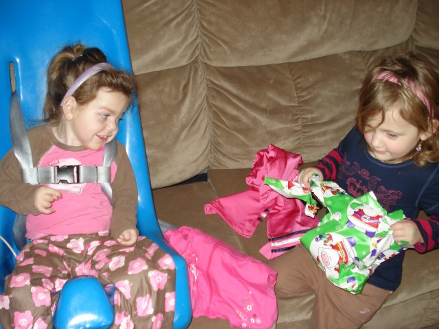 Abby helped Mary unwrap her clothes.